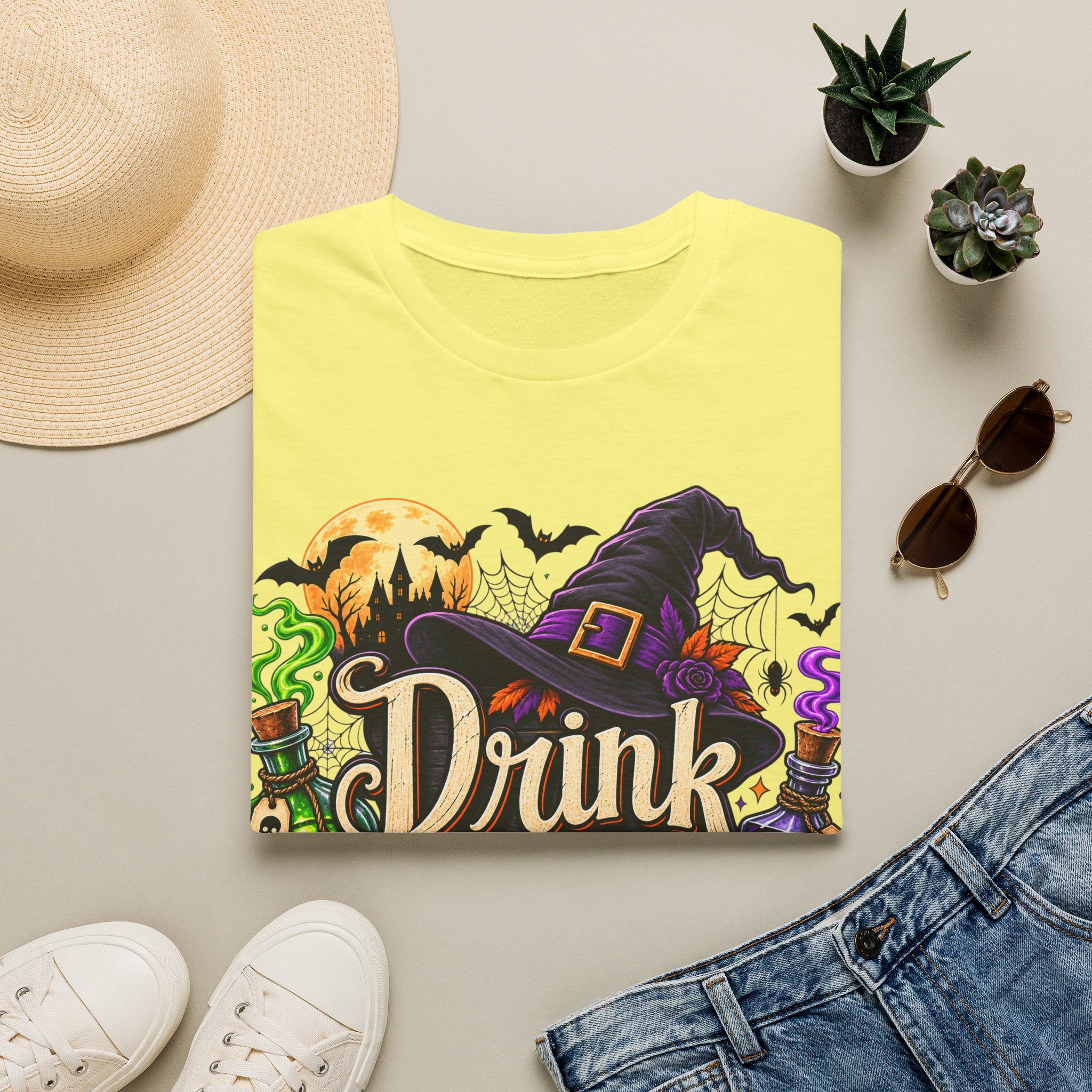 Close‑up of Drink Up Witches Halloween design with witch hat and cauldron