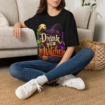 Drink Up Witches T‑Shirt with witch hat and cauldron graphic
