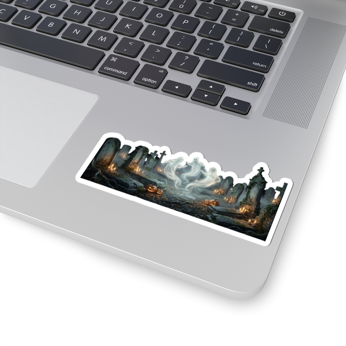 Kiss‑cut haunted graveyard sticker featuring glowing pumpkin, drifting ghost mist and eerie tombstones
