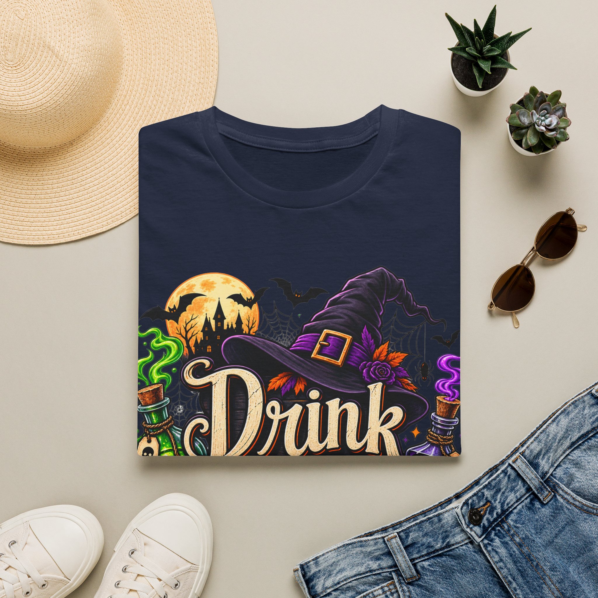 Close‑up of Drink Up Witches Halloween design with witch hat and cauldron