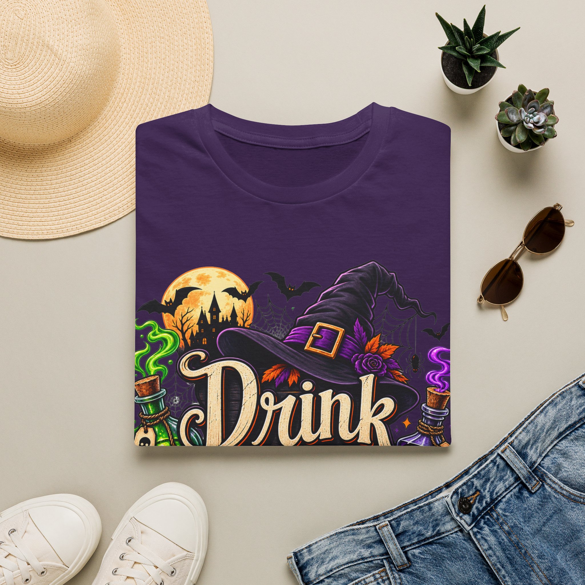 Close‑up of Drink Up Witches Halloween design with witch hat and cauldron