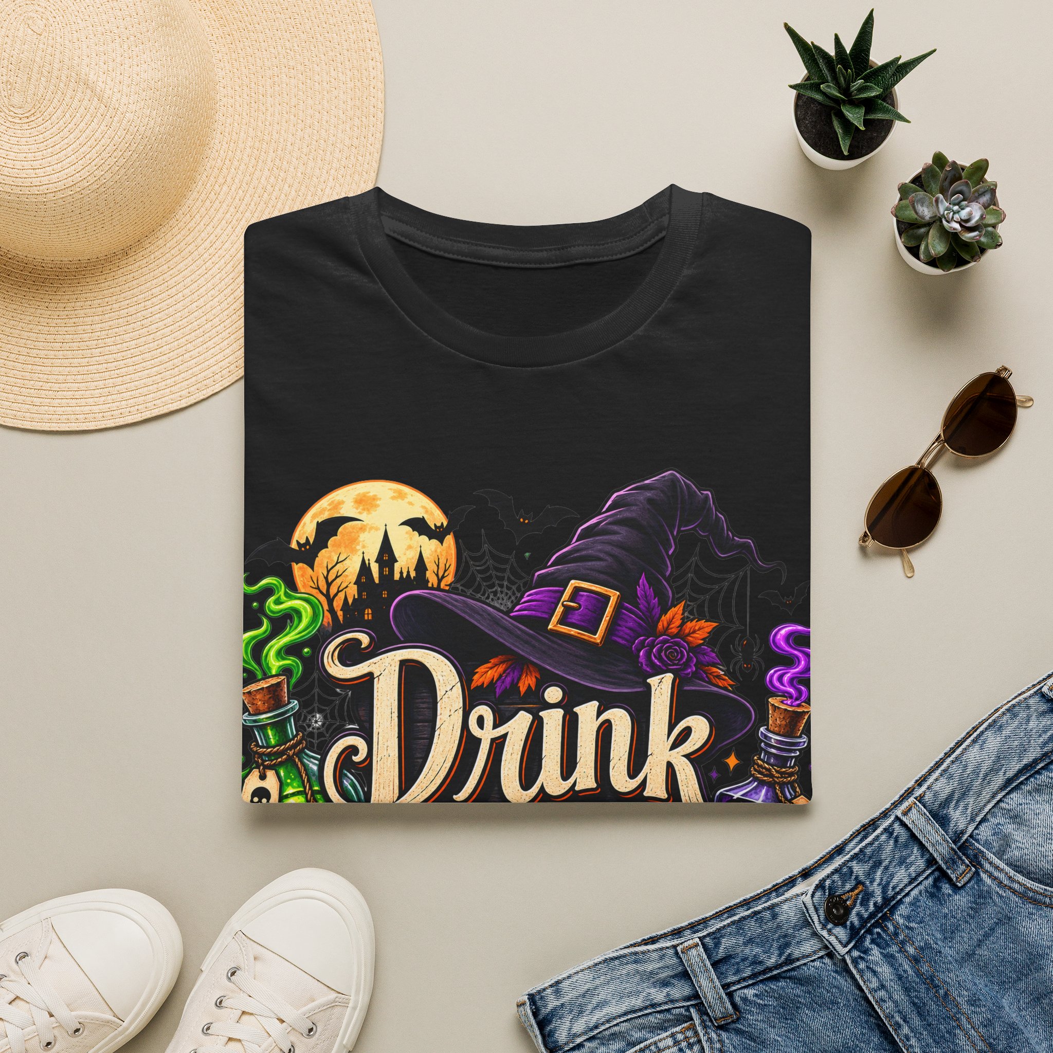 Close‑up of Drink Up Witches Halloween design with witch hat and cauldron